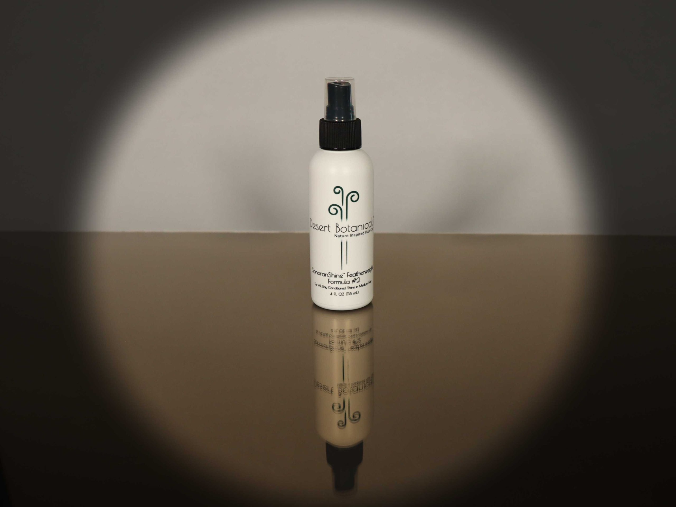 vignette of 4 oz bottle of propylene glycol free Sonoranshine Featherweight Hair Glosser #2 for Medium to Coarse Hair